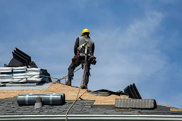 Professional Roof Replacement technician working in West Groton, MA